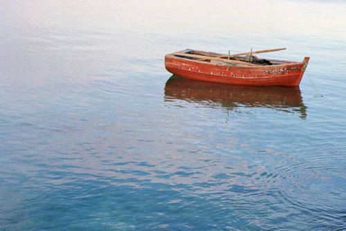 Red boat on water, taken at f/4