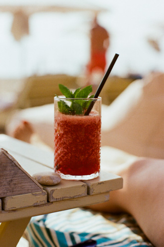 Red drink in a glass f/4